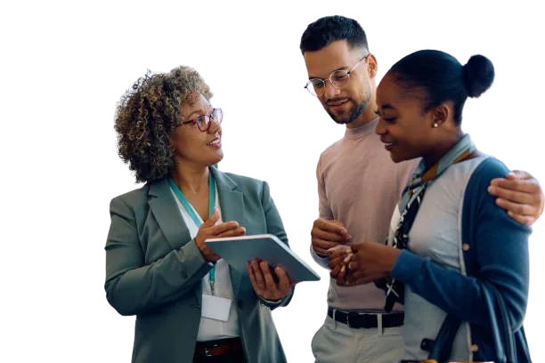 An adviser reviews project paperwork on a tablet with two buyers